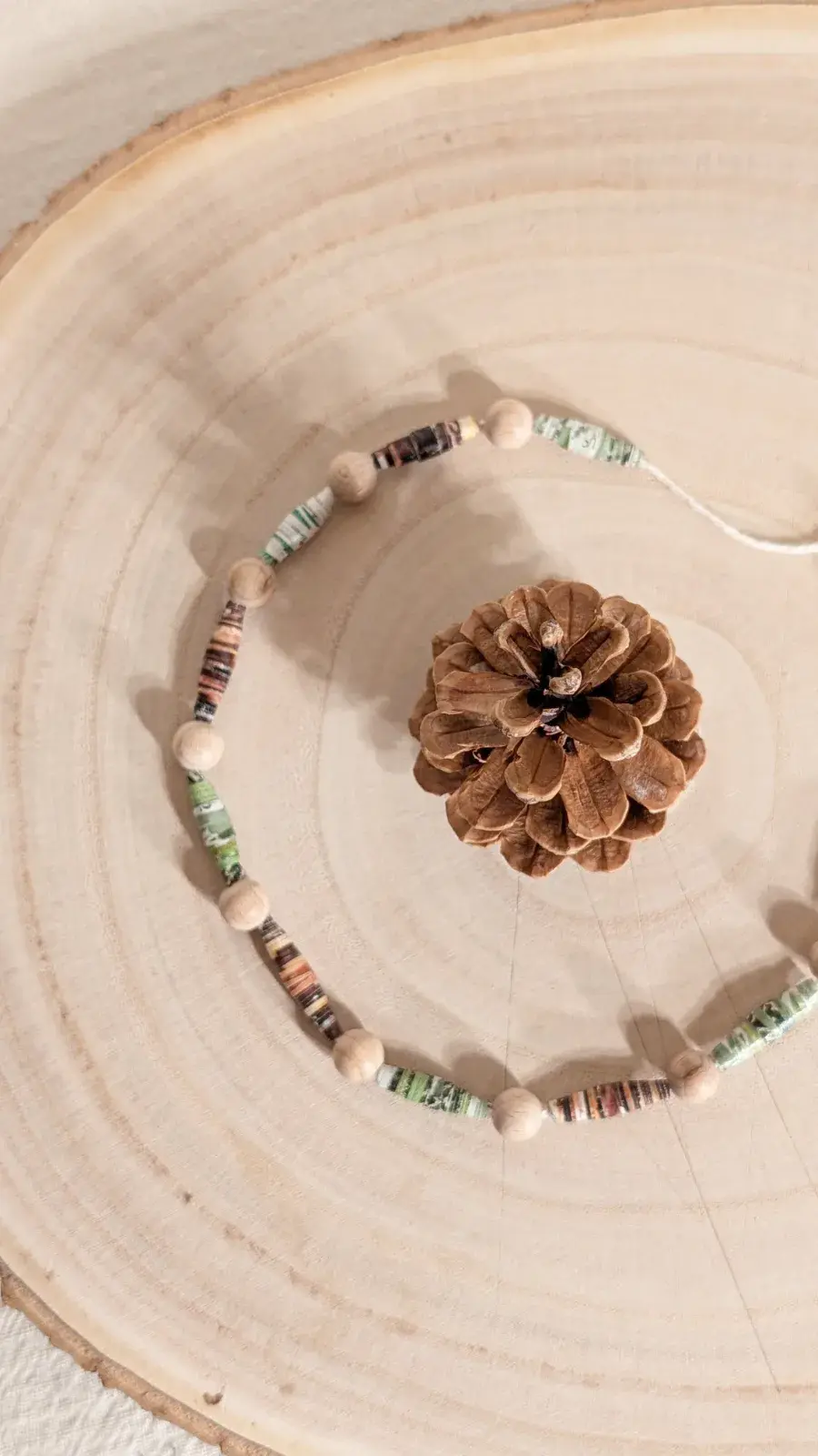 Rolled paper beads made from colorful paper scraps